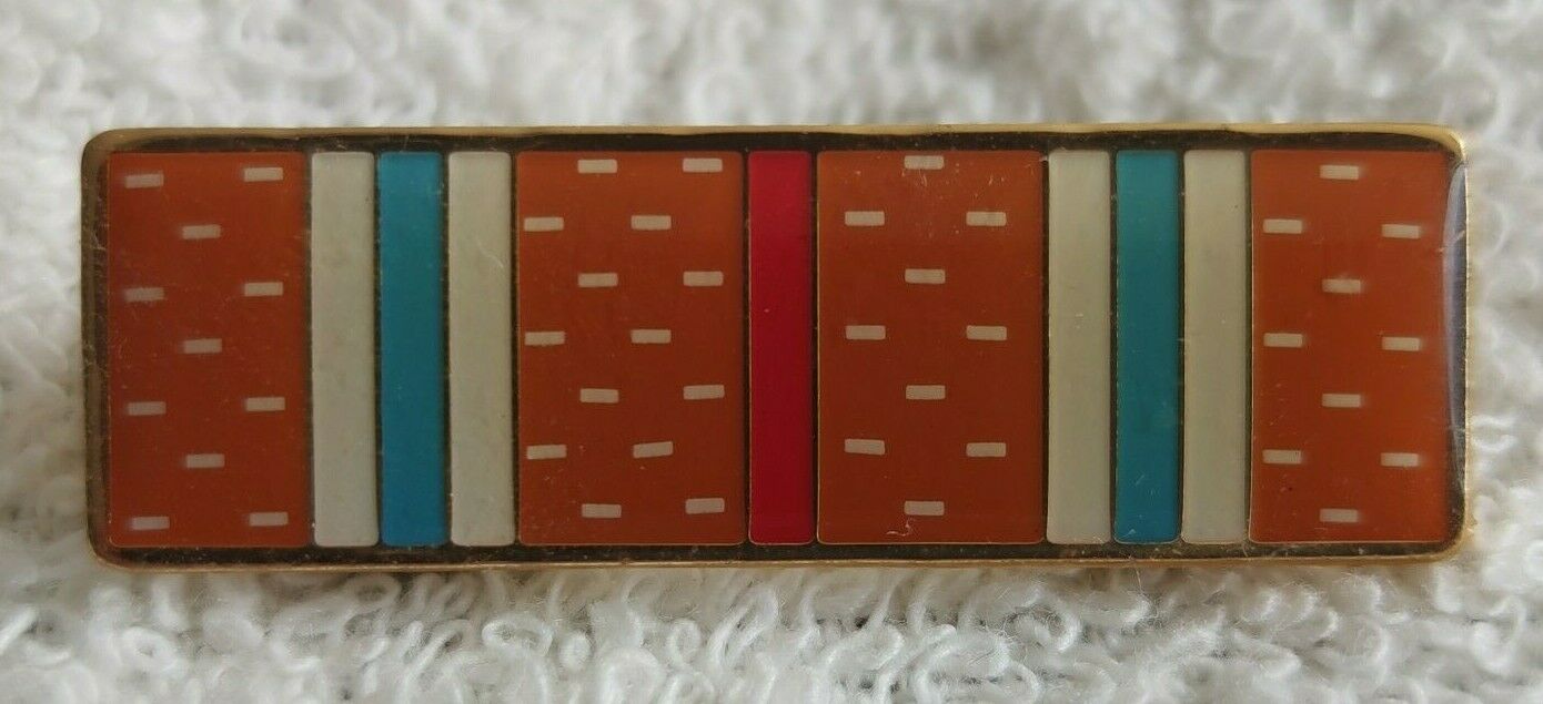 War Of Attrition ribbon enamel front