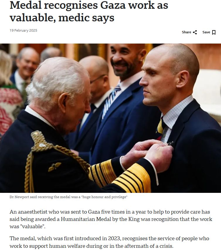 Dr Newport receives the humanitarian Medal